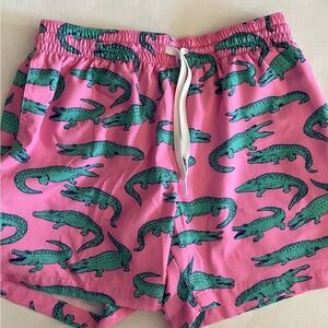 Chubbies Pink Swim Shorts with Green Alligator Design